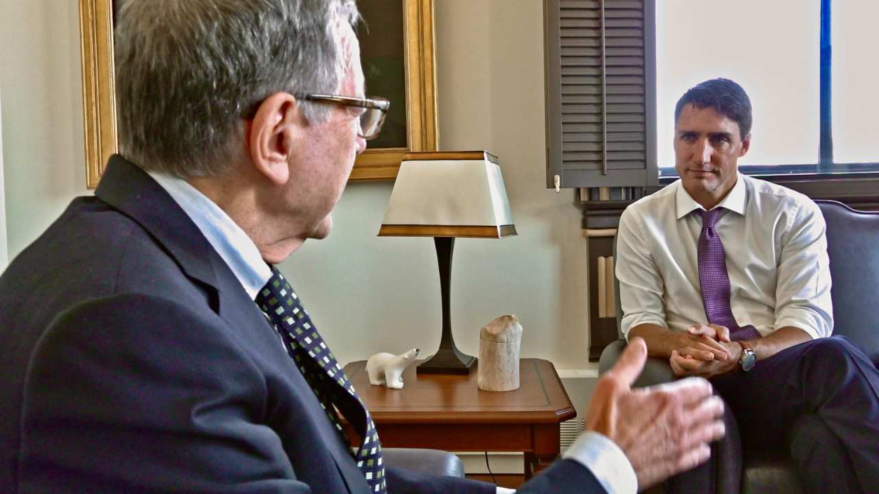 a man with Justin Trudeau